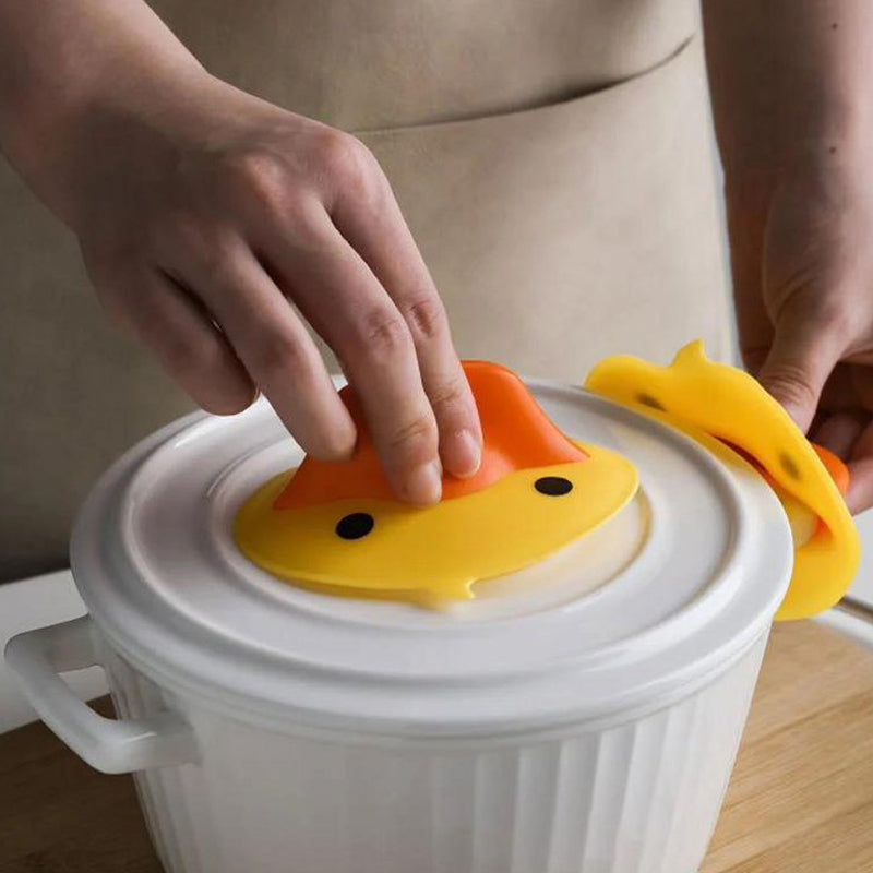 🦆 Koop 1 krijg 1 gratis！Veilige en leuke keukenhulp: de eendje anti-heet handgreep!